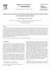 Research paper thumbnail of Interfacial interactions between hydrocarbon liquids and solid surfaces used in mechanical oil spill recovery